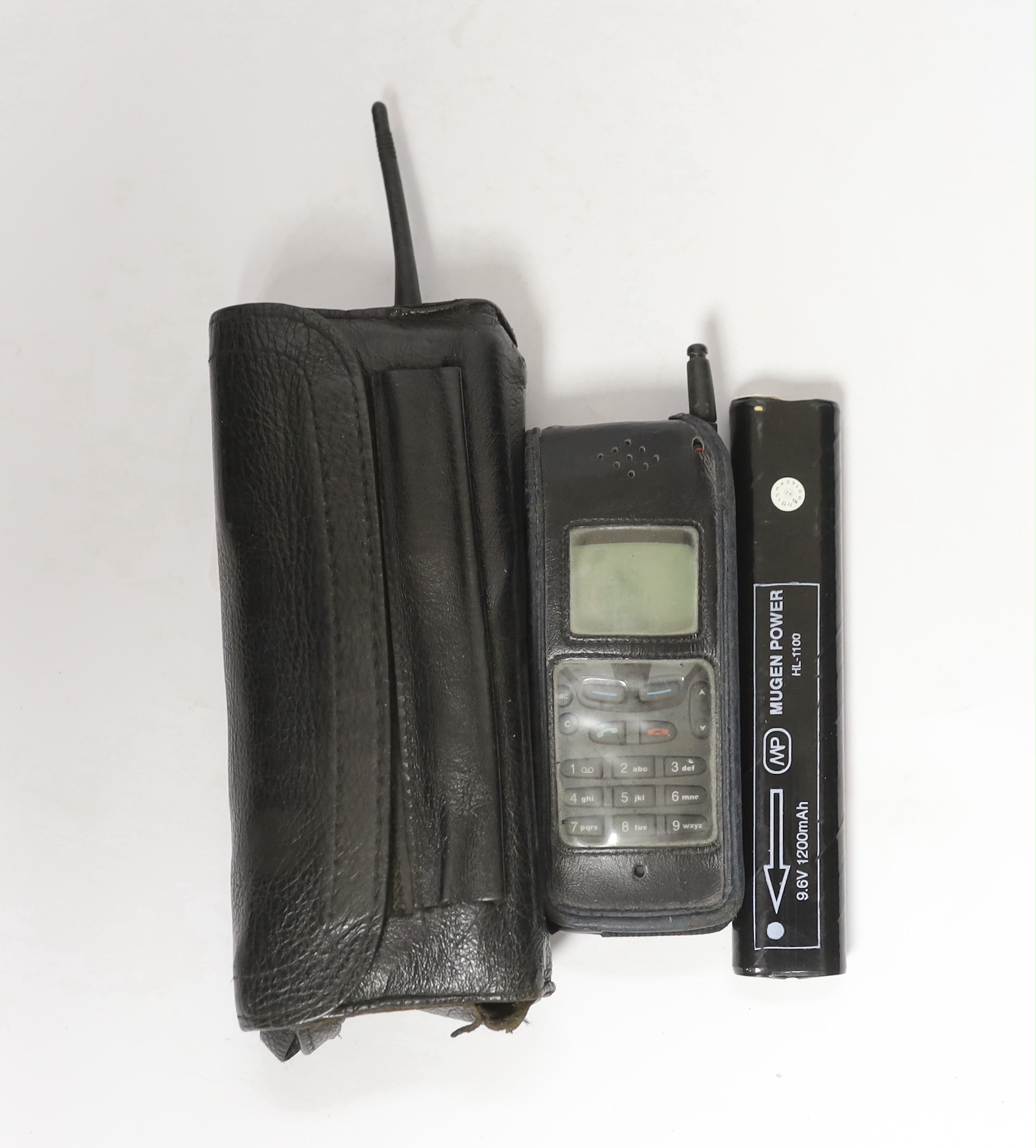 Two early Nokia mobile phones; a late 1980s Cityman 1320 ‘brick’ style analogue phone and a mid-1990s 2110 style GSM phone produced for Orange